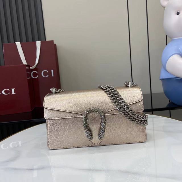Comes with full original designer packaging. This medium-sized bag features a cr