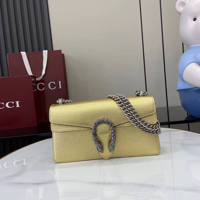 Comes with full original designer packaging. This medium-sized bag features a cr