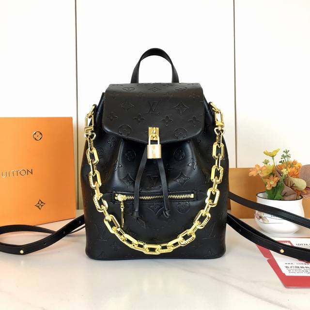 M13357 Coussin Backpack. This small backpack-style bag is a striking addition to