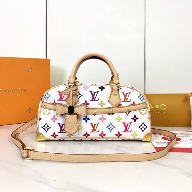 an updated version of the original M13084. This East West Handbag, part of the L