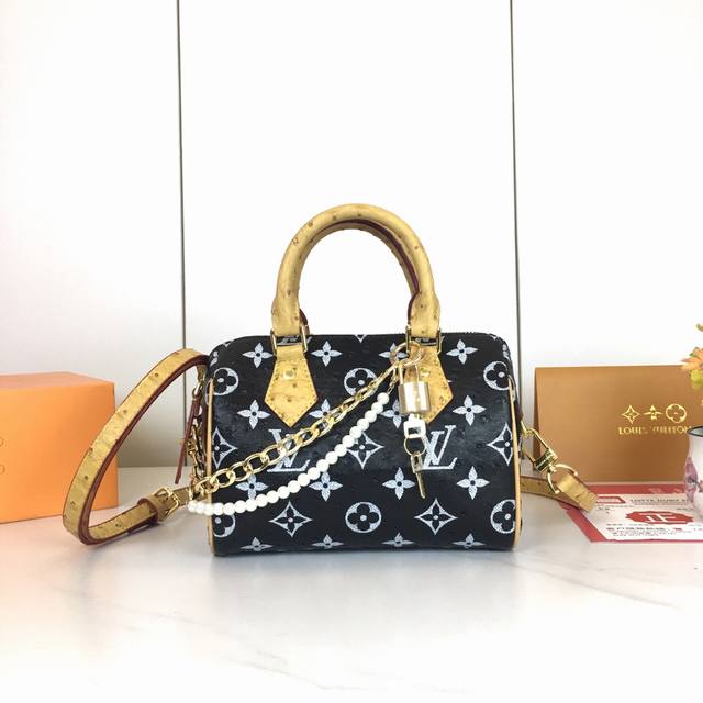 M87682. This Lv x Yk Nano Speedy bag embodies the infinity polka dot theme of th