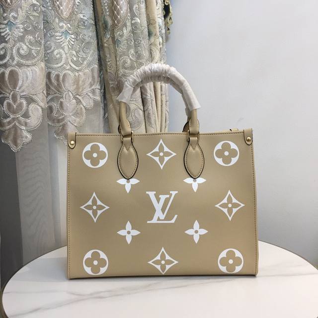 M45494 This Onthego Tote bag features a Monogram pattern, first printed and then