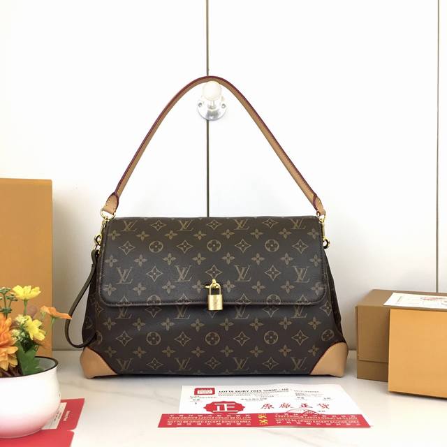 Upgraded from the original M14473, this Hide Away handbag is crafted from Monogr