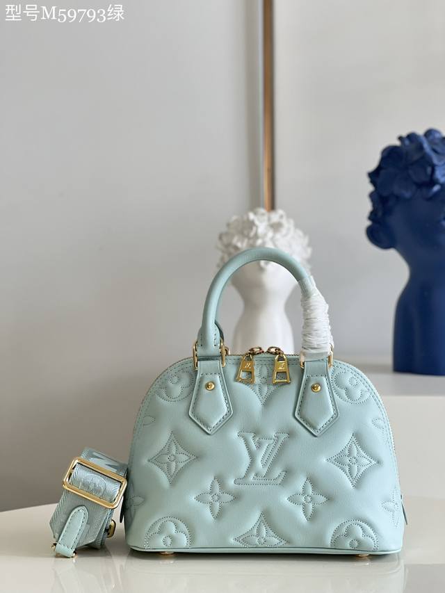 The top-of-the-line original M59793 green Alma Bb handbag embodies the essence o