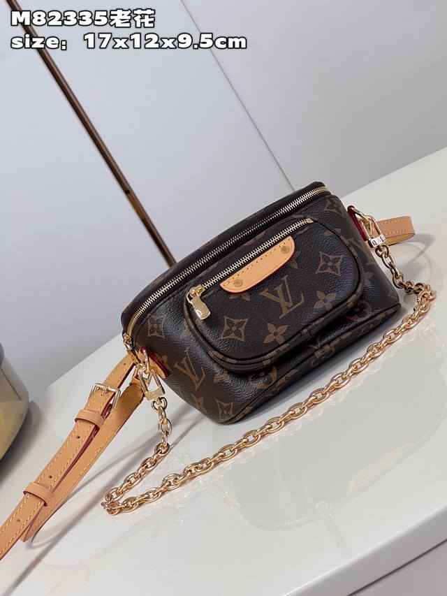 This premium, original Mini Bumbag handbag is crafted from Monogram canvas, show