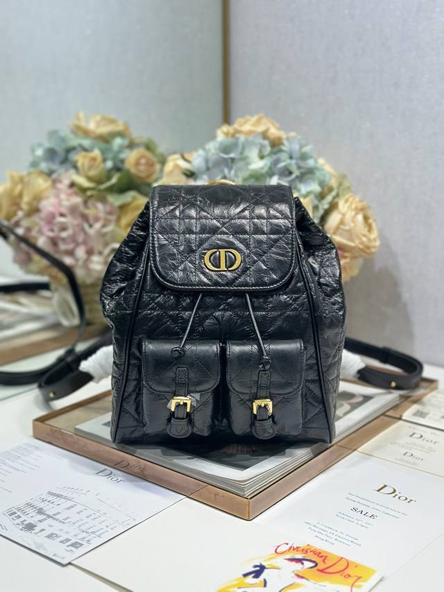 Medium Dior Caro Backpack Hand-scratched Black This Dior Caro backpack is a new