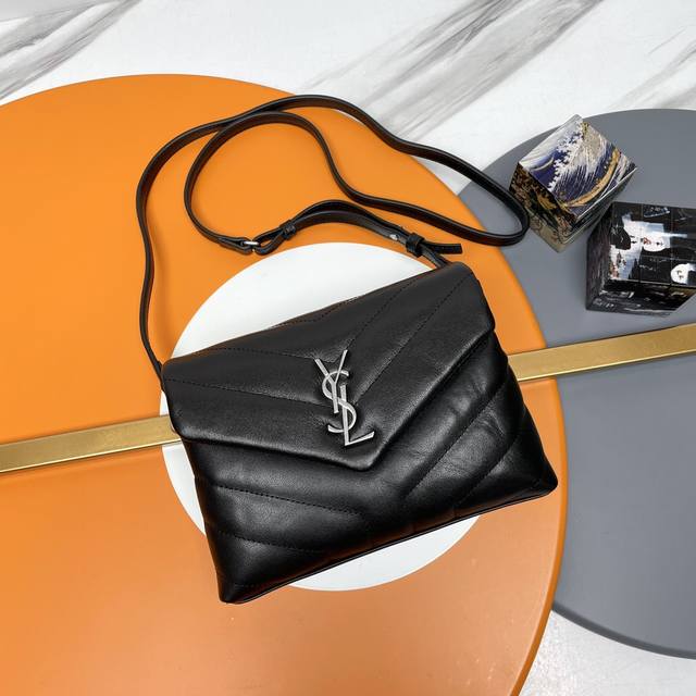 The original version of the black silver-buckle P Loulou mini crossbody bag is h