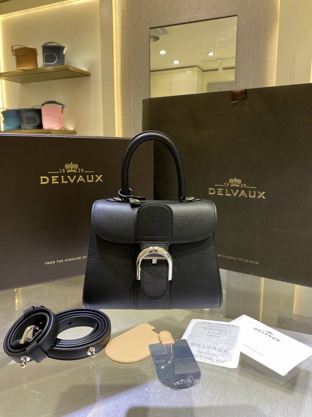 Premium Del Vaux Brillant Togo leather, a Belgian Royal brand. Comes with an adj