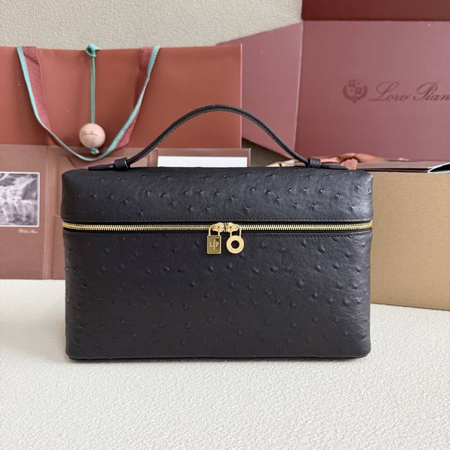 Extra Pocket L27 Gold Buckle Color: Black This wide-mouthed clutch is crafted fr