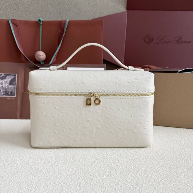 Extra Pocket L27 Gold Buckle Color: Pastel White This wide-mouthed clutch is cra