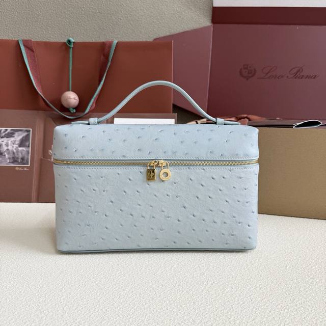 Extra Pocket L27 Gold Buckle Color: Haze Blue This wide-mouthed clutch is crafte