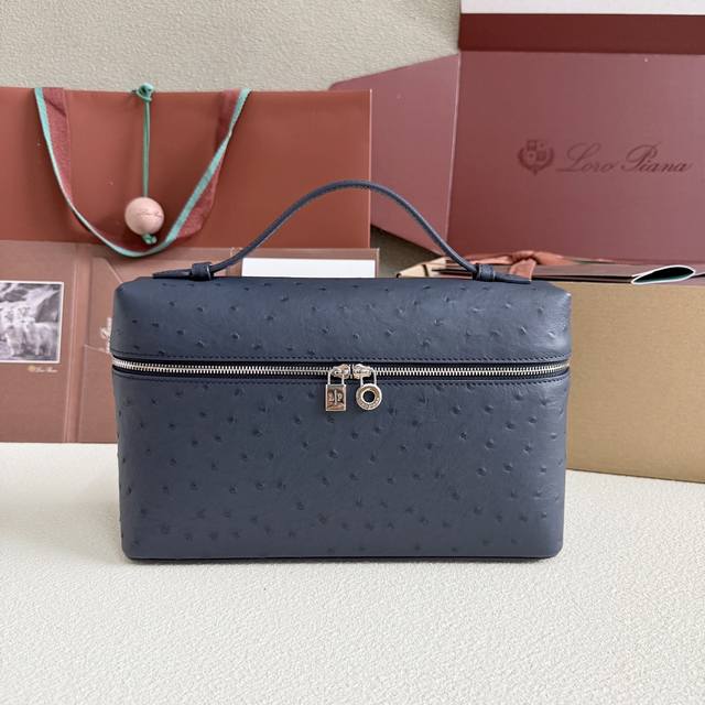 Extra Pocket L27 Silver Buckle Color: Midnight Blue This wide-mouth clutch is cr