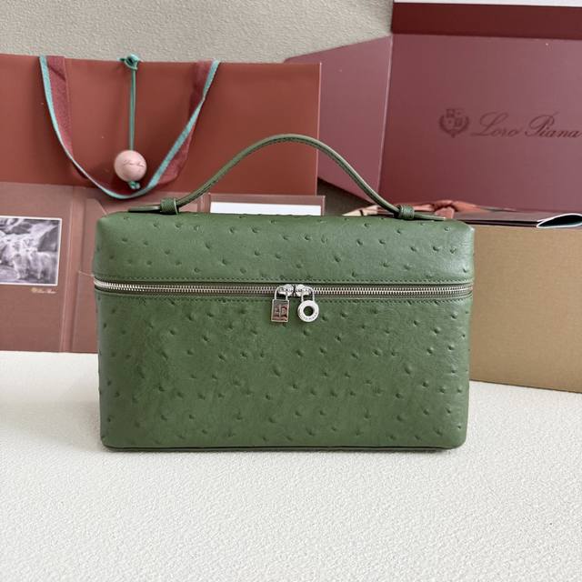 Extra Pocket L27 Silver Buckle Color: Lichen Green This wide-mouthed clutch is c