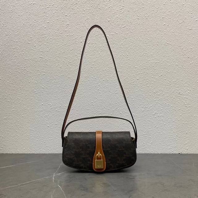 Premium original Cel*Ine Tabou Clutch. Perfect for both hand and shoulder use du