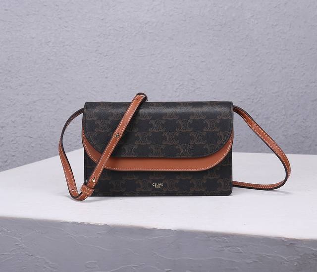 s latest "monopoly" crossbody multi-layered small bag. Snap-on multi-layered fun
