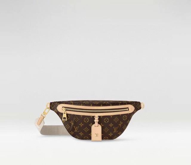 Original M46784 The definition of casual chic: This high-rise bag is made from M