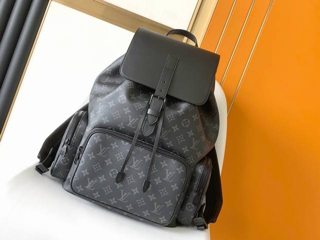 Premium Original Black Flower M45538 Trio Backpack. The Trio backpack features a