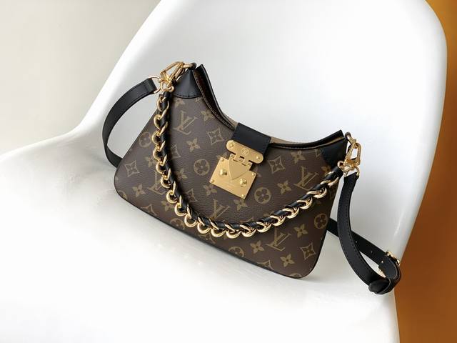 M46659 Premium Original. This handbag draws inspiration from classic designs in