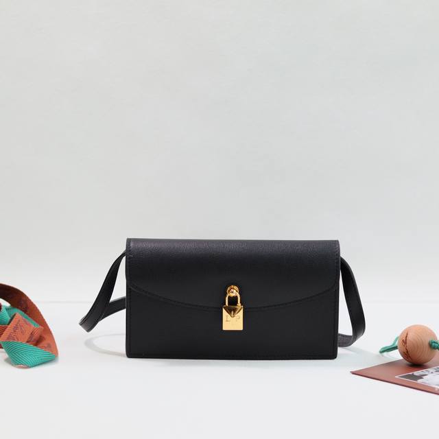 Loro Piana Pickette Clutch Color: Grain Palm Print This elegant clutch from the