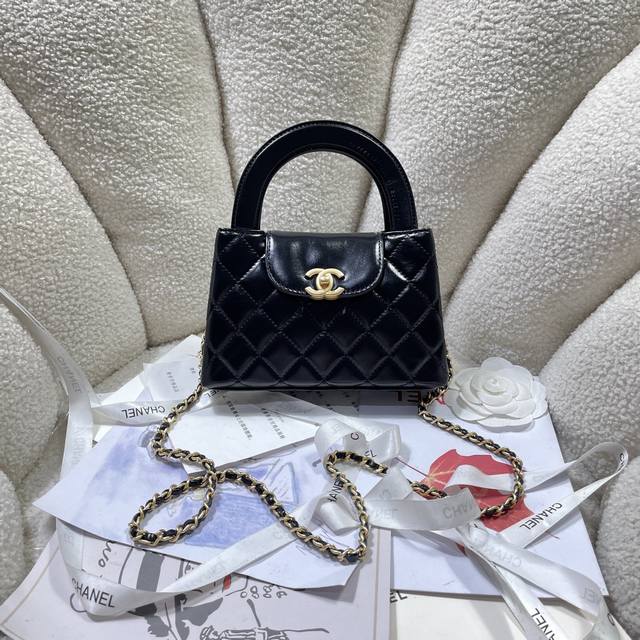Black with gold buckle! In stock: 24A Kelly handle bag in velvet. Fashion is a c