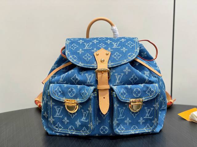 Original M95056 blue denim backpack. LV Vintage M95240 rose pink backpack. This