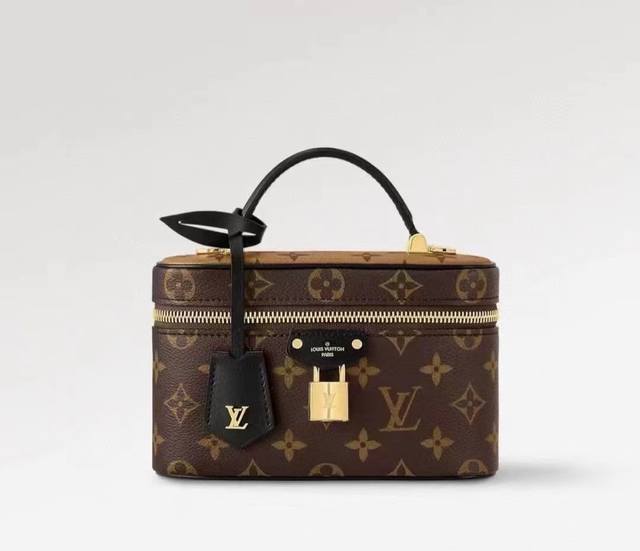 Real photos of the original M47125 Vanity Chain Pouch. This handbag draws inspir
