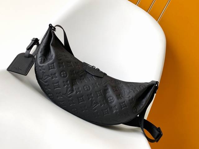 M12850 Large Hamac Handbag in Monogram canvas, featuring a reversible chip and p