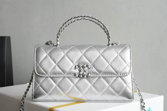 Platinum Edition, authentic packaging as shown, now available. Leather chain han