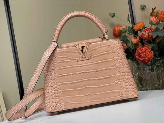 Exclusive photo of the original Capucines Bb handbag M92173 48865 in orange croc