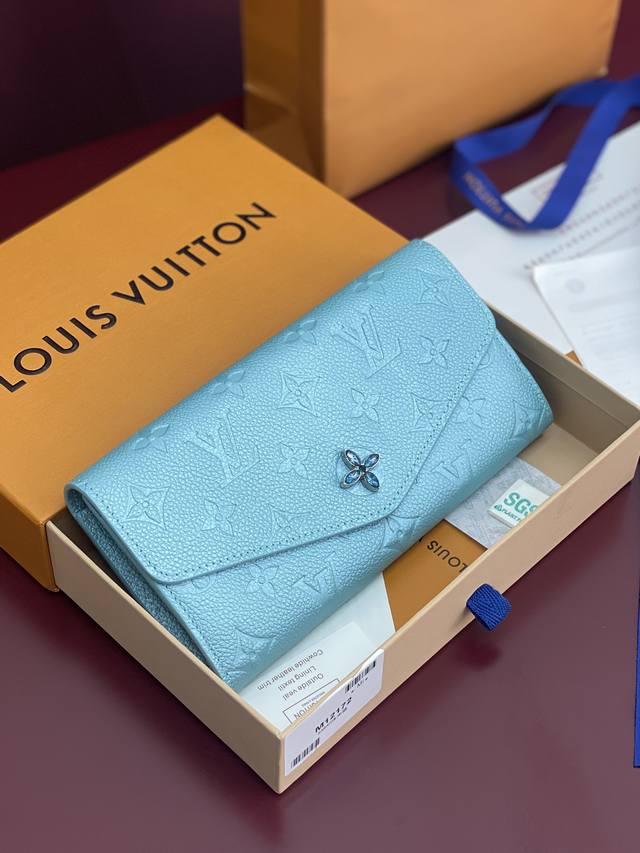 Factory Price: P M12172 Pearlescent Blue! This Sarah wallet is crafted from impo