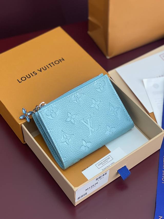 Factory Price: P M12536 Pearlescent Blue! This Lisa wallet is crafted from impor