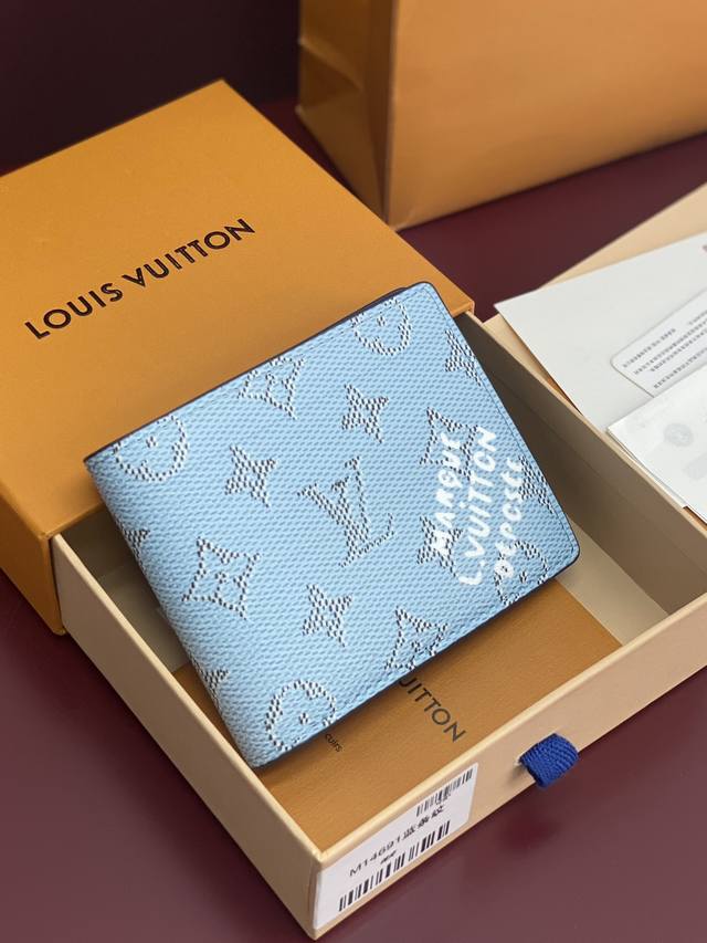 Factory Price P M14691 Blue Stripes! This Multiple Wallet is crafted from Monogr