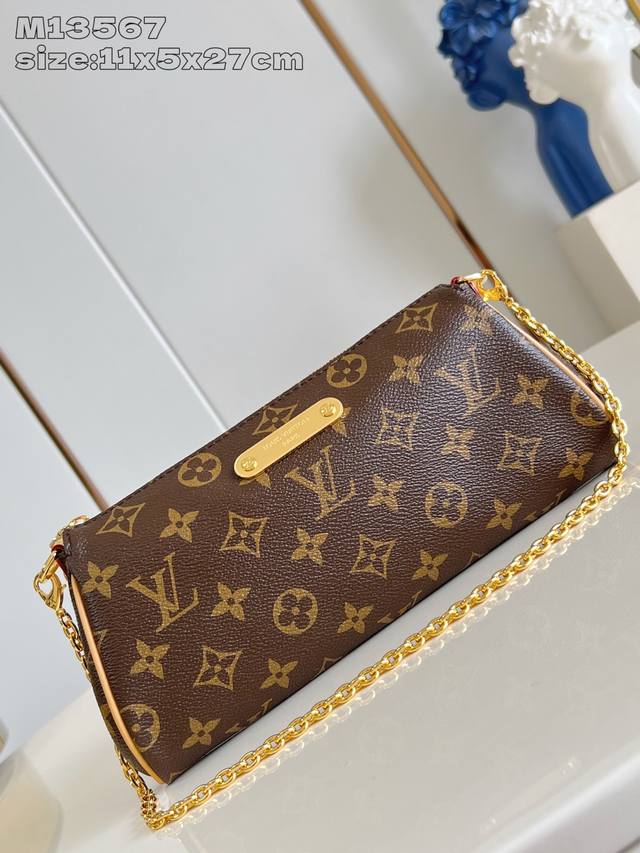 Factory Price P Premium Original M13567 Monogram This Pochette Eva handbag featu