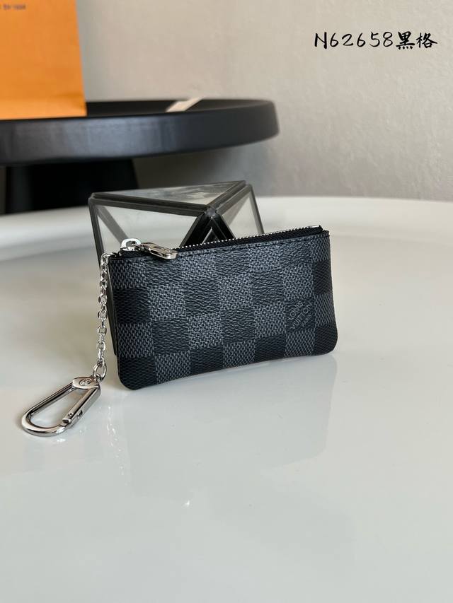 Factory Price P Chip Version N62658 Black Grid! This wallet evokes the leisurely