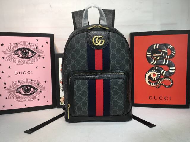 Ophidia family backpack features classic Gg fabric paired with brown textured co