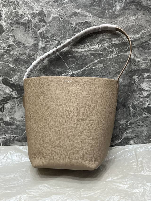 Special Price: Medium Lychee Milk Tea. The Park Tote features a minimalist, cool