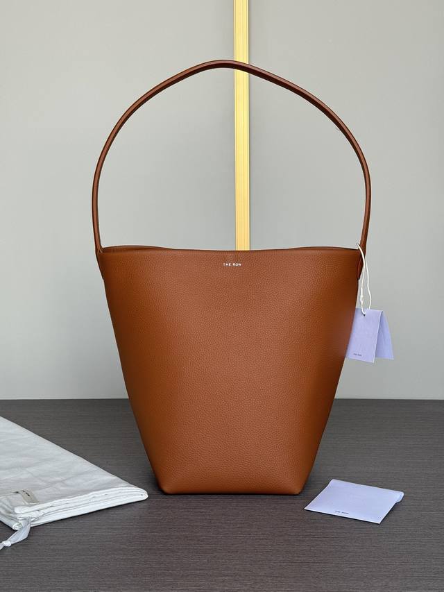 Special Price: Top-Quality Original The Row Classic Bucket Bag. This minimalist,