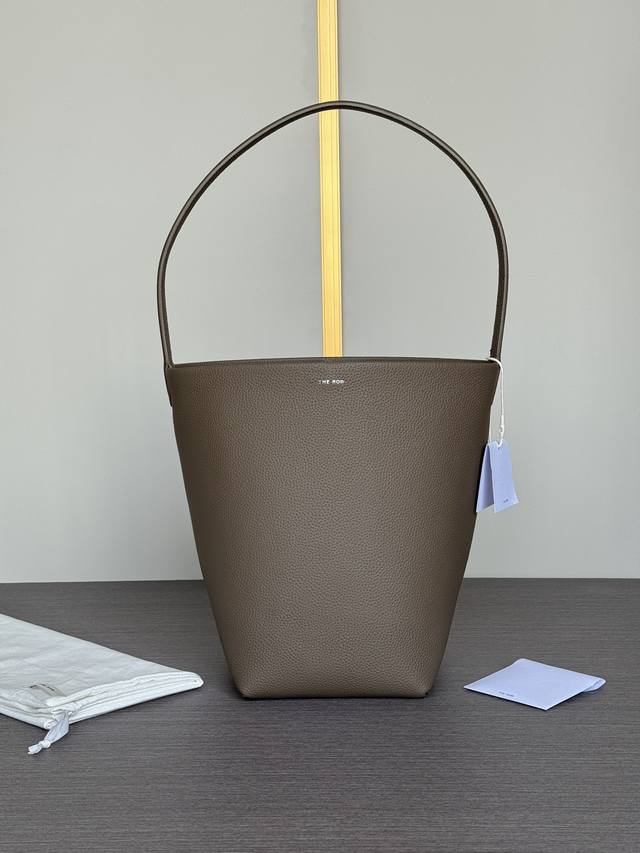 Special Price: Top-Quality Original The Row Classic Bucket Bag. This minimalist,