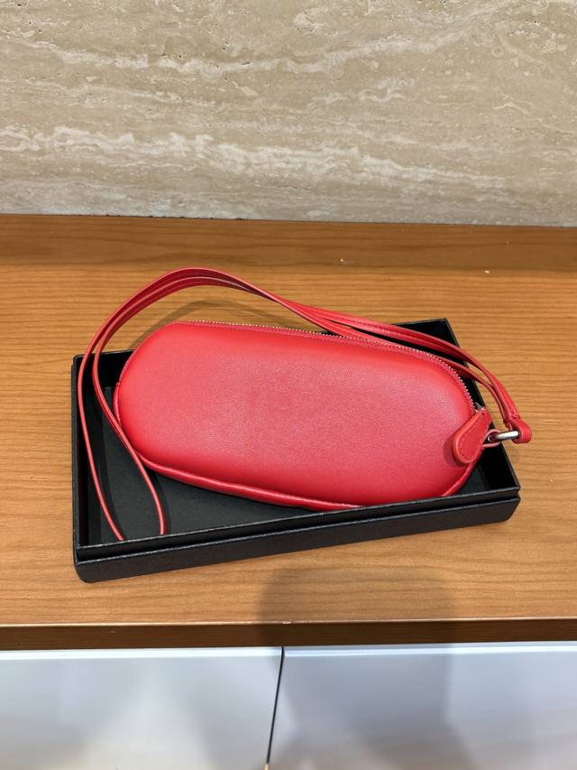Tr The Row Sunglasses Case: A portable eyewear bag that combines elegance and pr