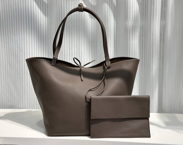 Tr The Row Park Tote. This unlabeled leather tote bag boasts a uniquely casual a