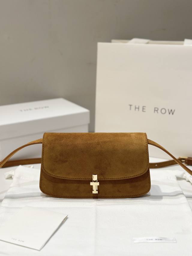 This simple and compact bag in matte brown is neat and crisp without any unneces