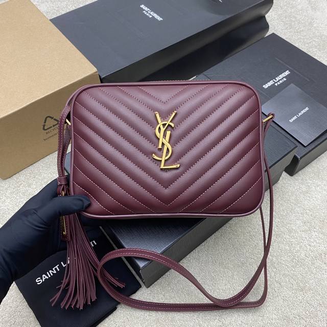 a brand new upgraded version of the popular Y-brand Lou Bag camera bag in red an