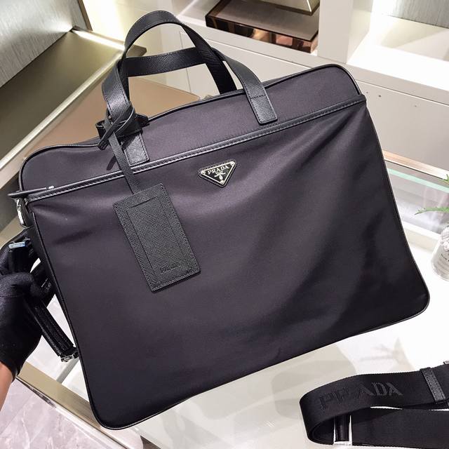 New Release Pr*Da 2Ve015 Men's Nylon Handbag, the latest "Trinity" model. Can be