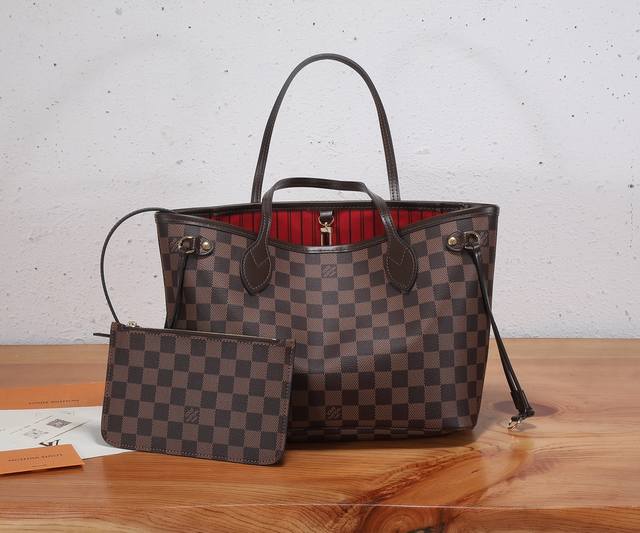 This premium, original, enhanced Neverfull Small bag combines classic design wit