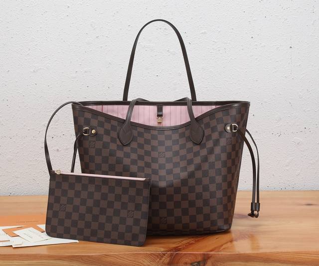 s premium, original, enhanced Neverfull medium bag combines classic design with