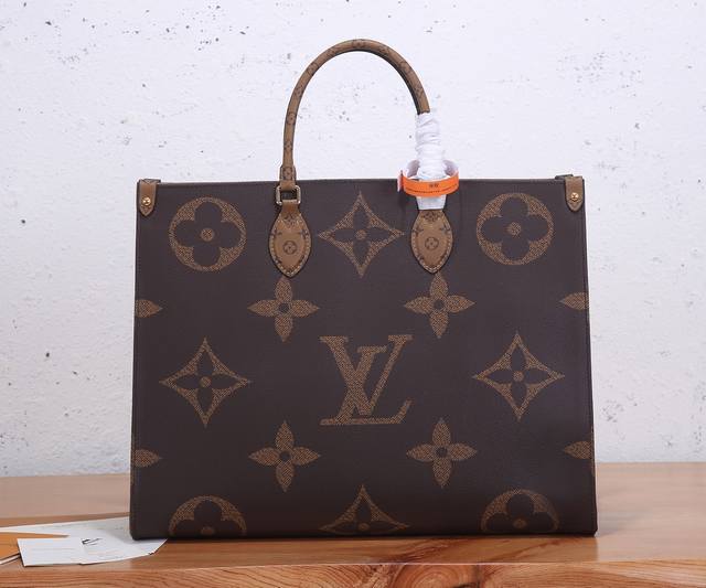 a premium original. This enhanced Onthego handbag stands out against the backdro