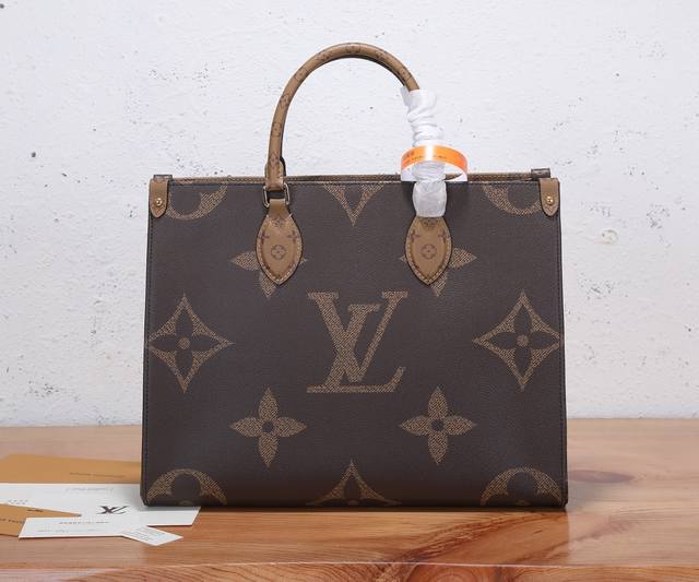 Premium Original, the enhanced Onthego Medium Handbag features classic Monogram