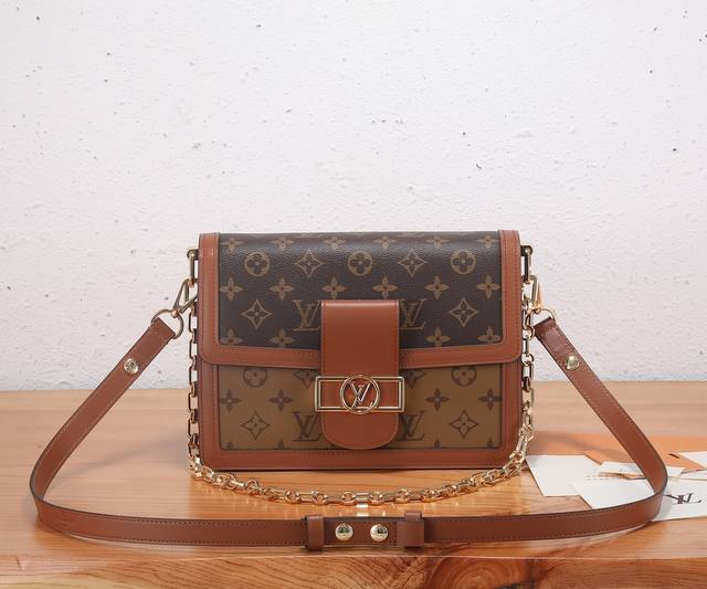 A top-of-the-line, enhanced version of Louis Vuitton's iconic Dauphine handbag c