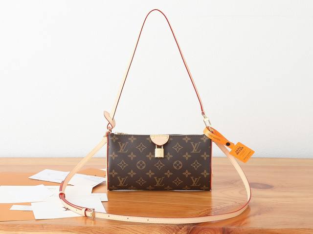 chip-coded version of premium Pochette Tirette handbag, crafted from Monogram ca