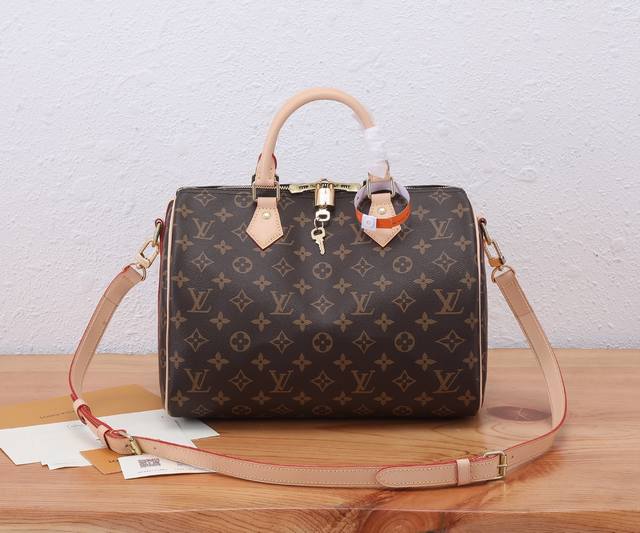 Premium Original, Enhanced Edition. Every feature of this Speedy bag is a classi